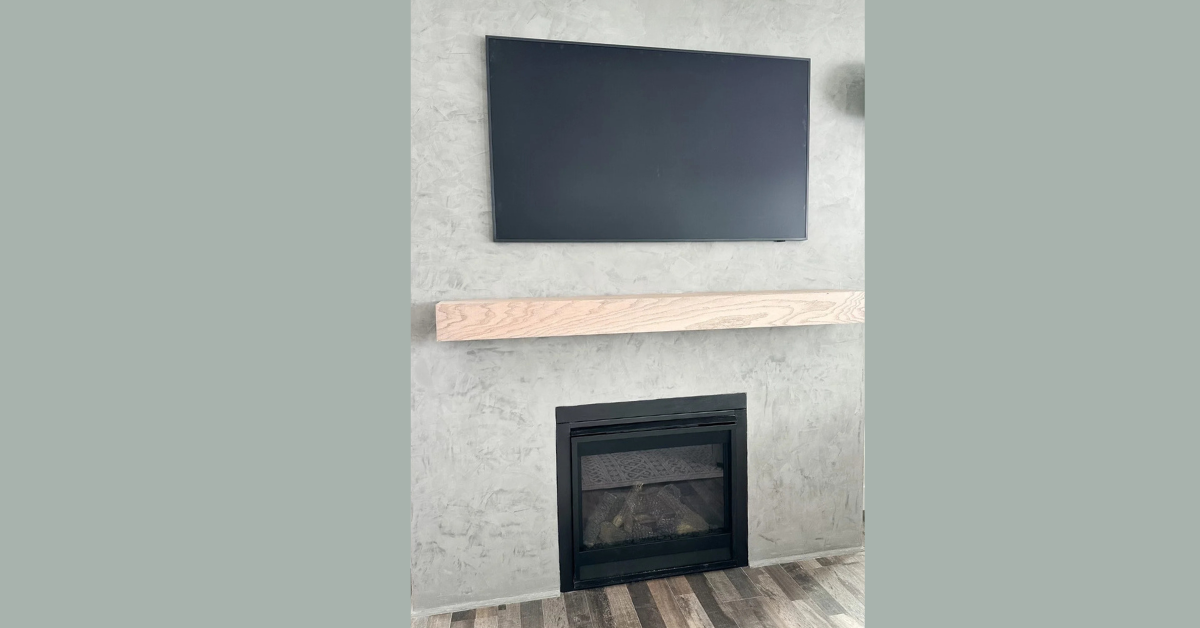 DIY roman clay fireplace with wood mantel
