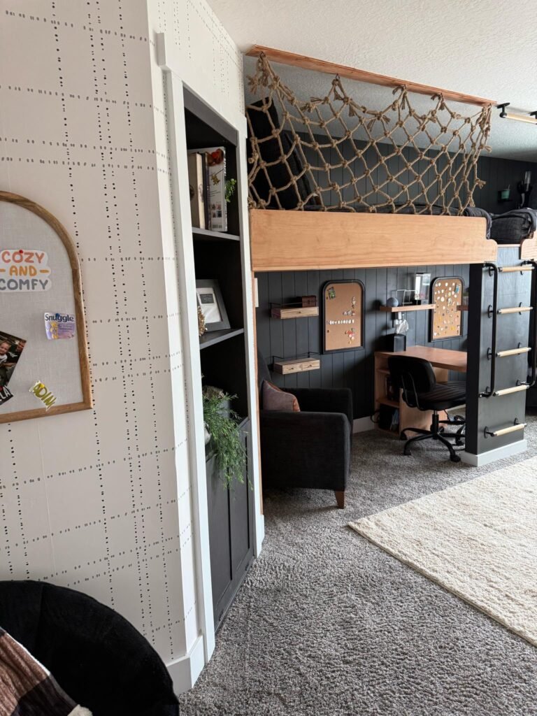 Boys sports bedroom with double loft bed