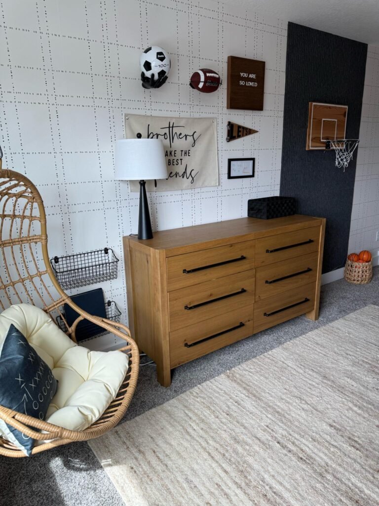 Boys sports bedroom decor and wallpaper with hanging chair