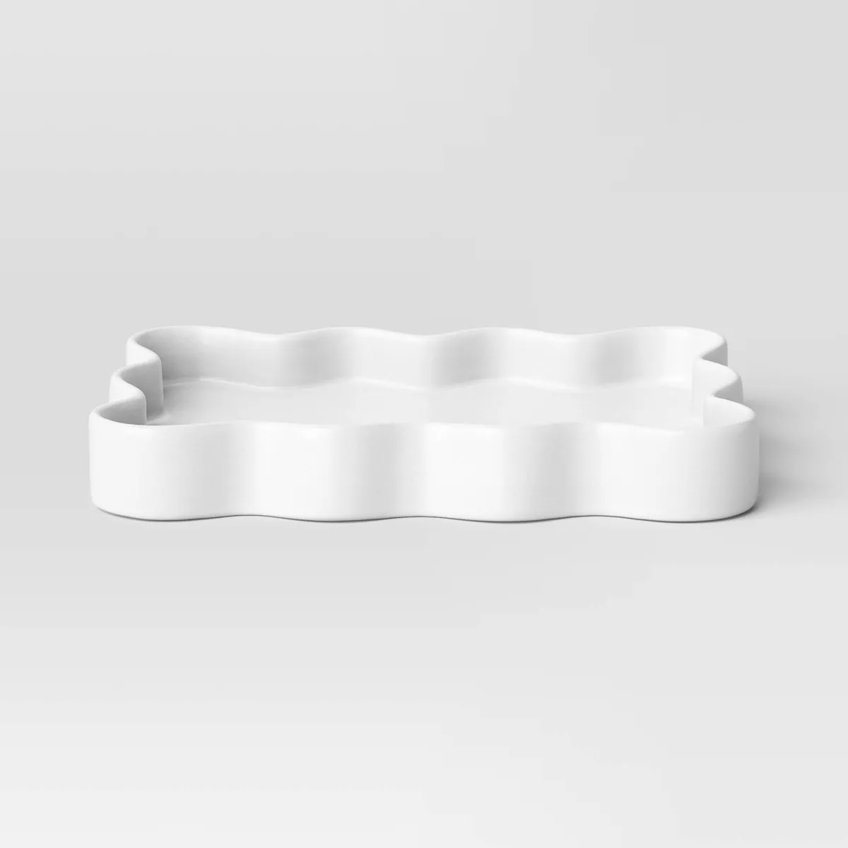 A white scallop tray is great for keys, cards, and jewelry