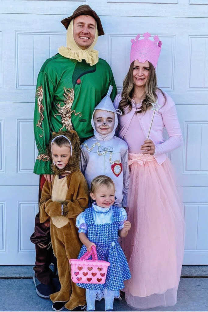 Family Wizard of Oz costume: Scarecrow, Glinda, Tin Man, Cowardly Lion, Dorothy