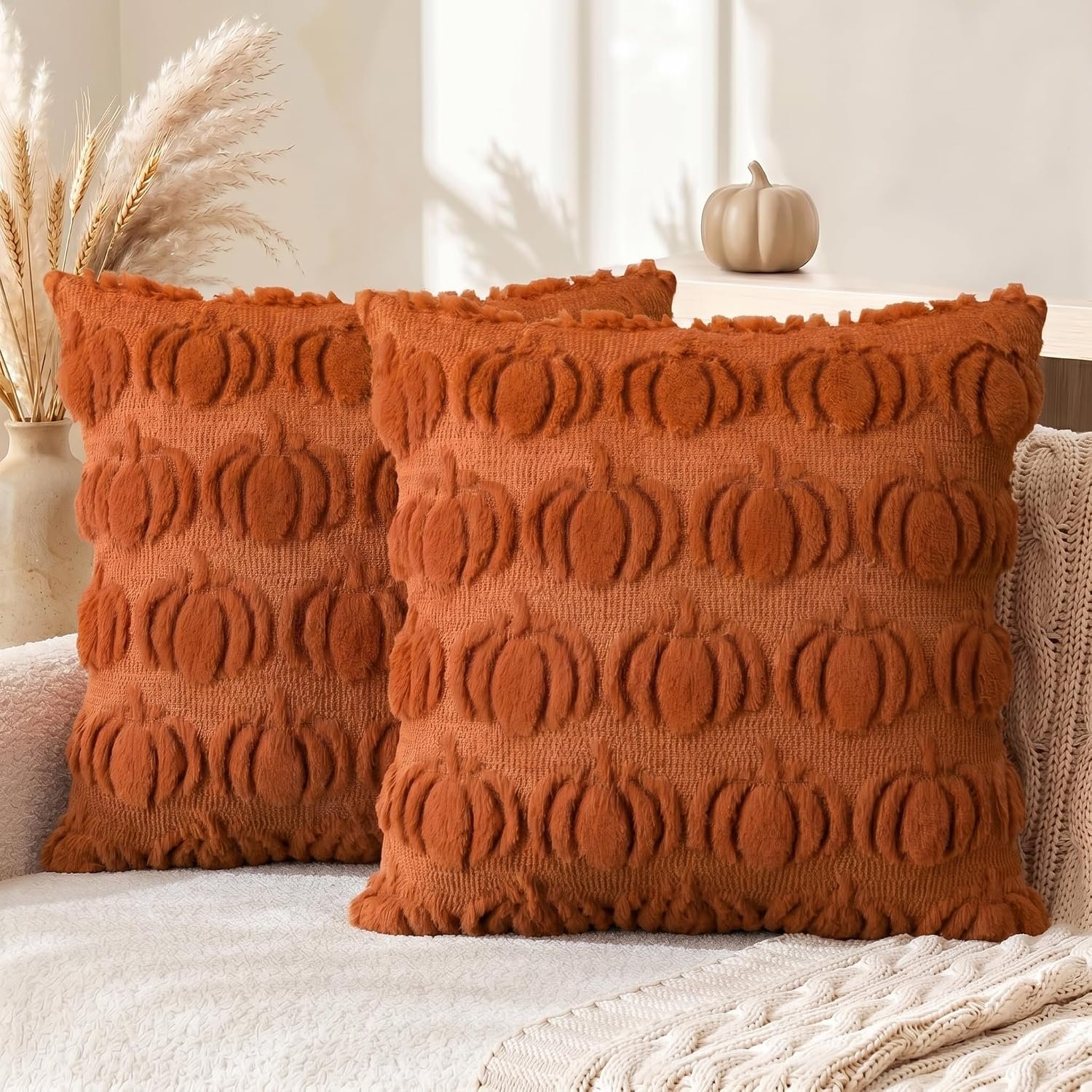 Orange pumpkin pillows to pair with DIY pumpkin arch
