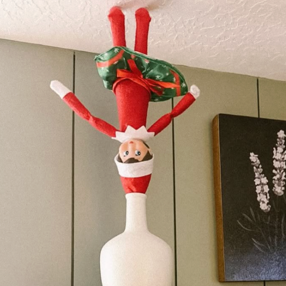 Elf upside down, sticking to the ceiling