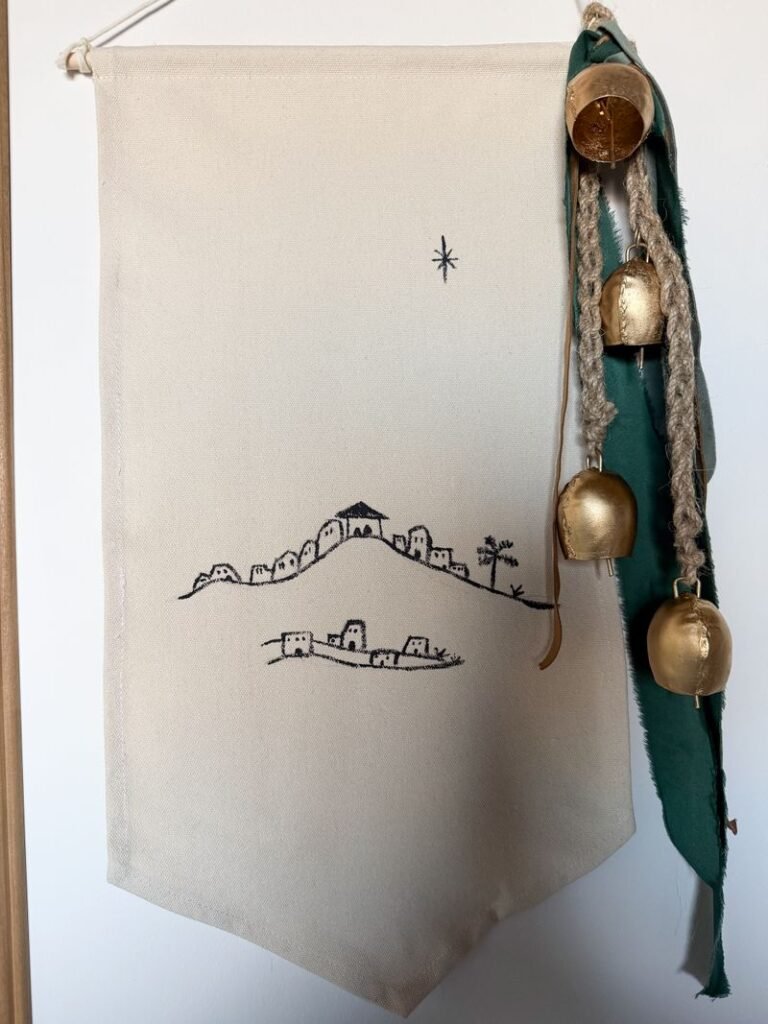 Bethlehem banner with bells and ribbon