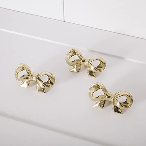 Gold bow drawer pulls