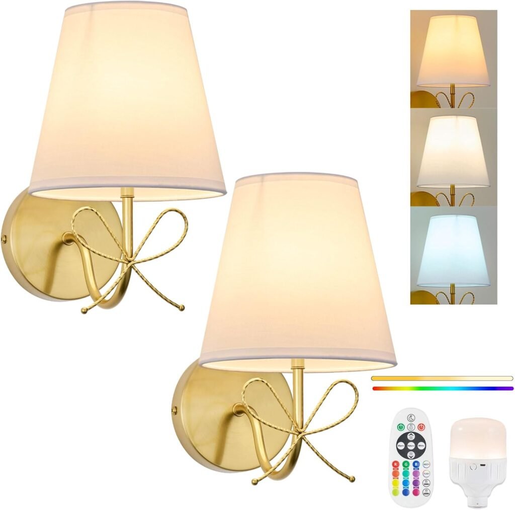 Gold sconces with bows and beige shades