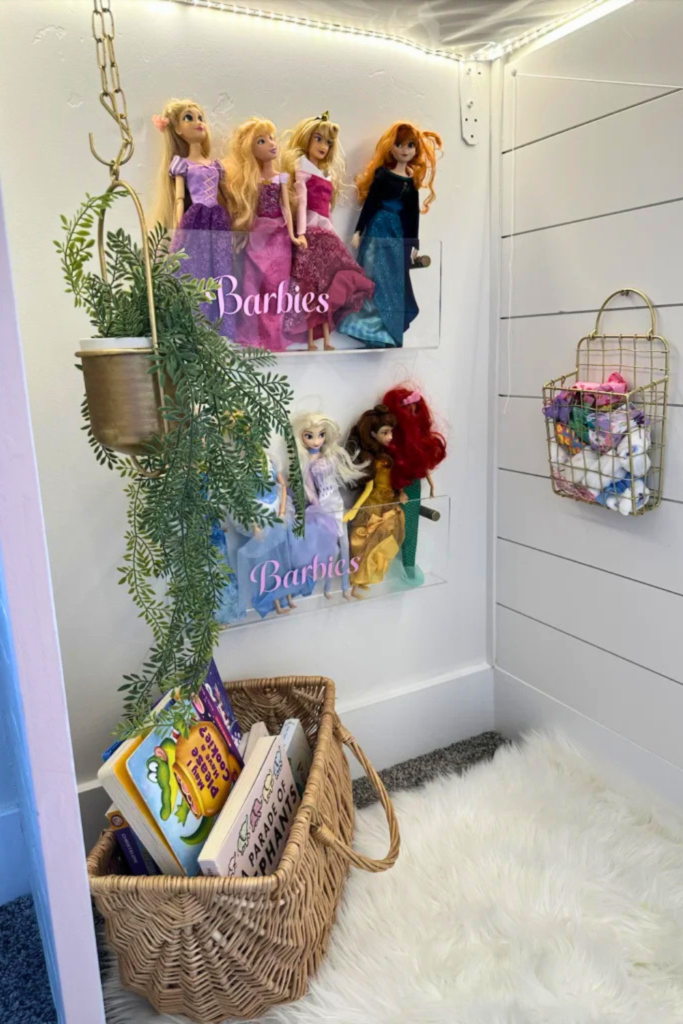 Barbie storage with acrylic containers on wall; woven basket holding books on the ground; faux fur white rug 