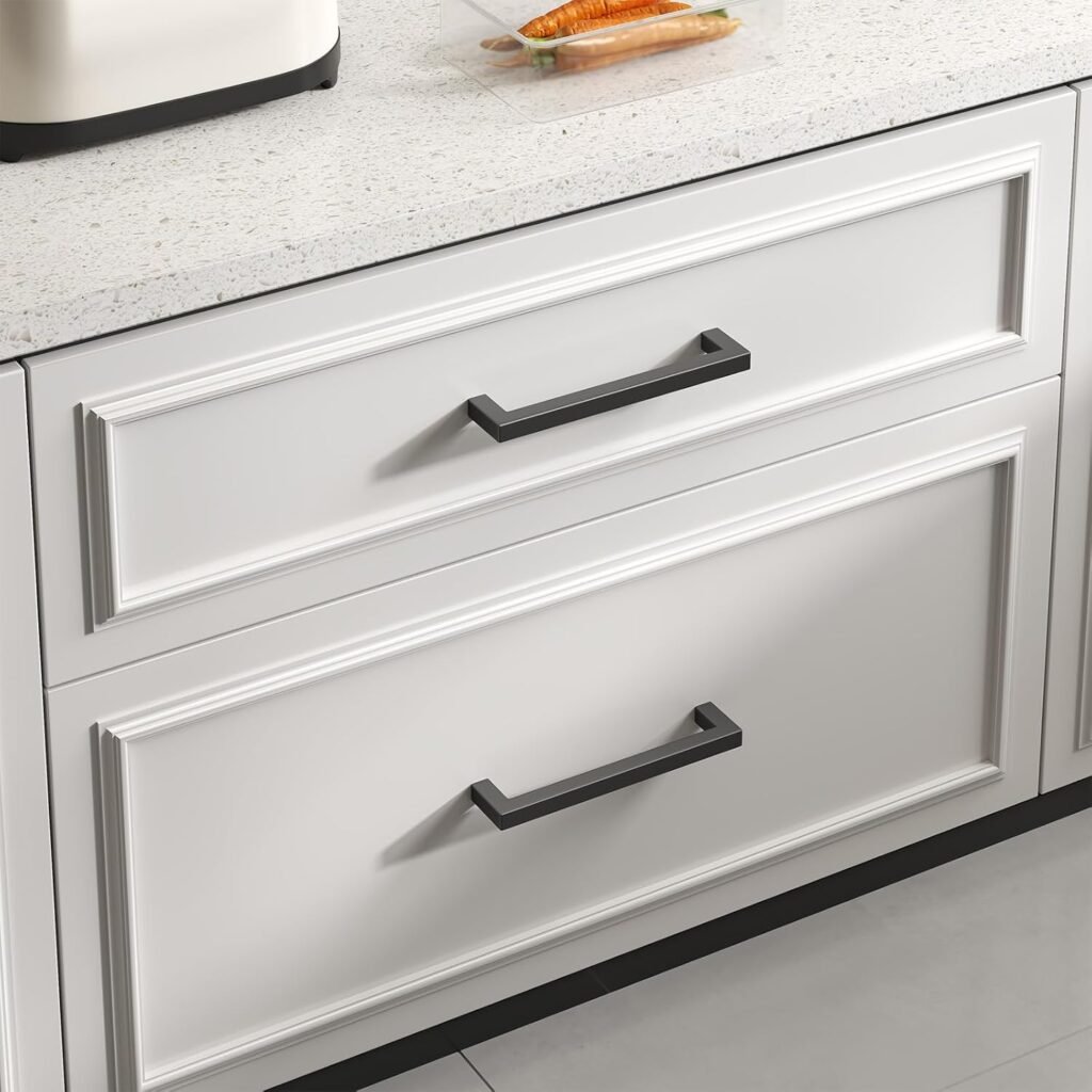 Matter black pulls on white shaker style cabinets