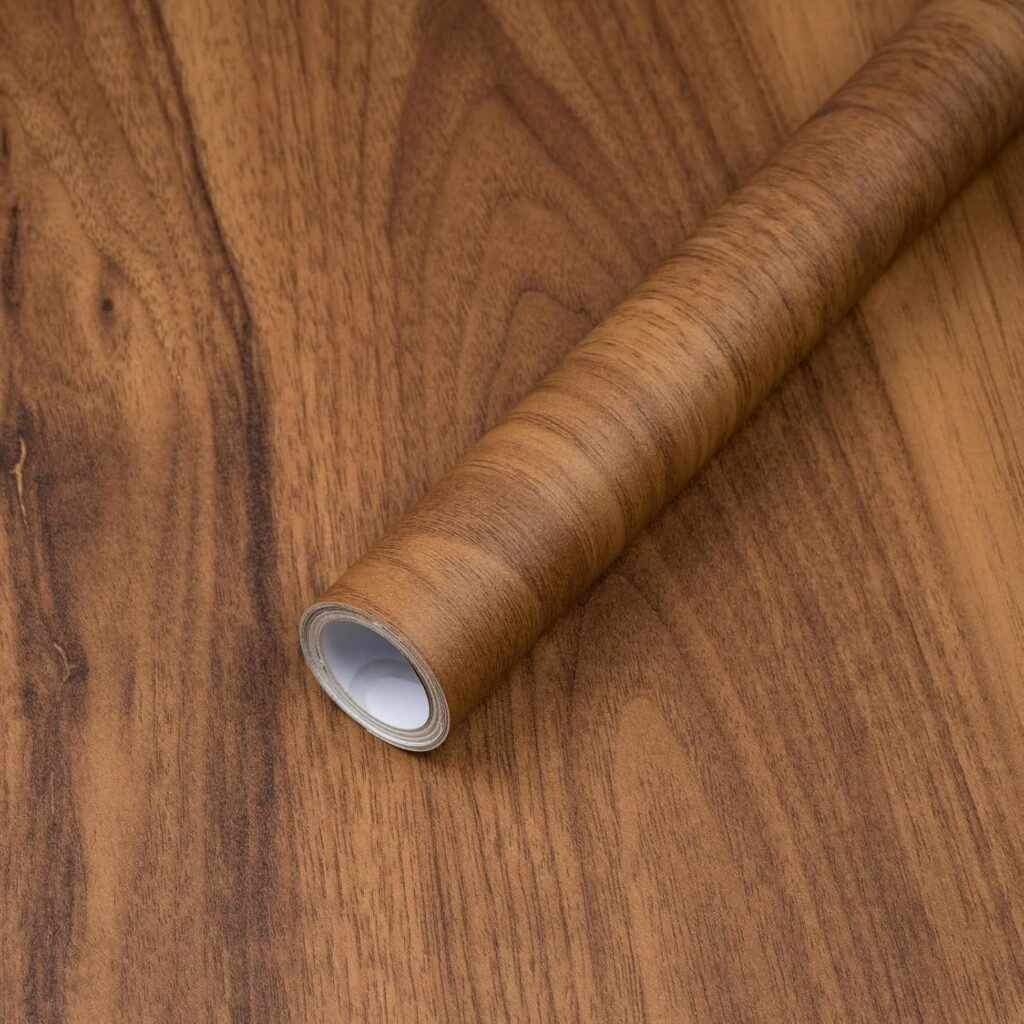 How to Update Cabinets on a Budget: Use warm brown faux wood contact paper to hide dated or damaged interior cabinets