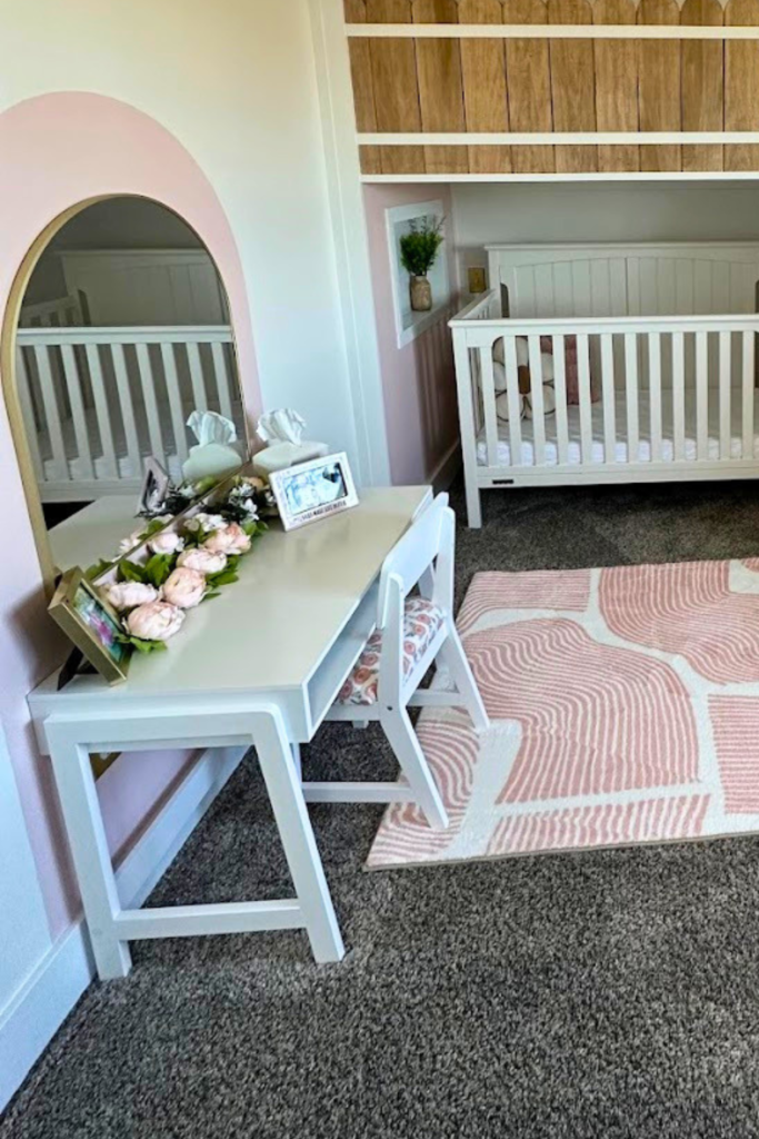 Cool Kids' Room Ideas: white desk with arched gold mirror above it, pink and white rug on the floor