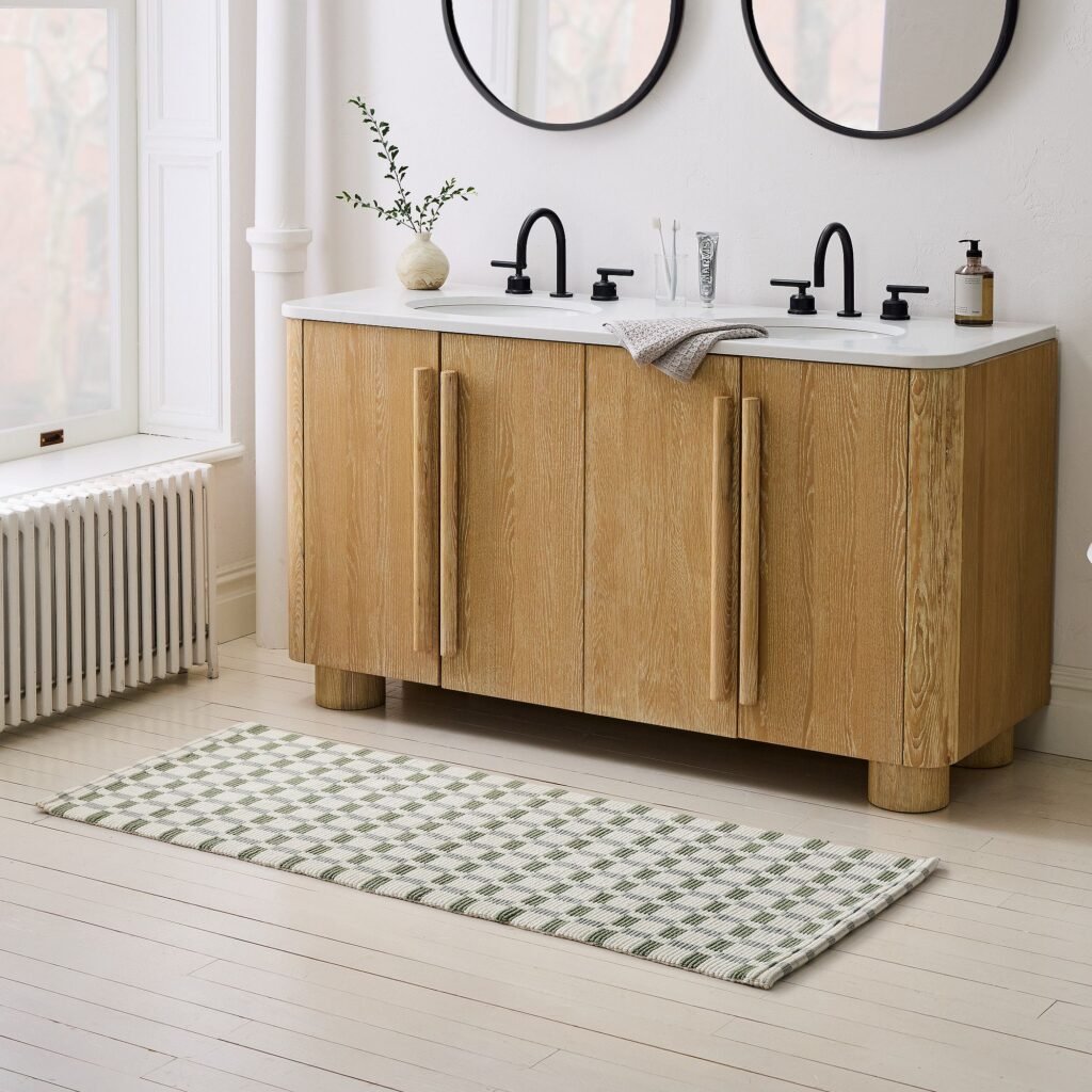 Green and blue ribbed bathroom runner, light oak modern cabinets