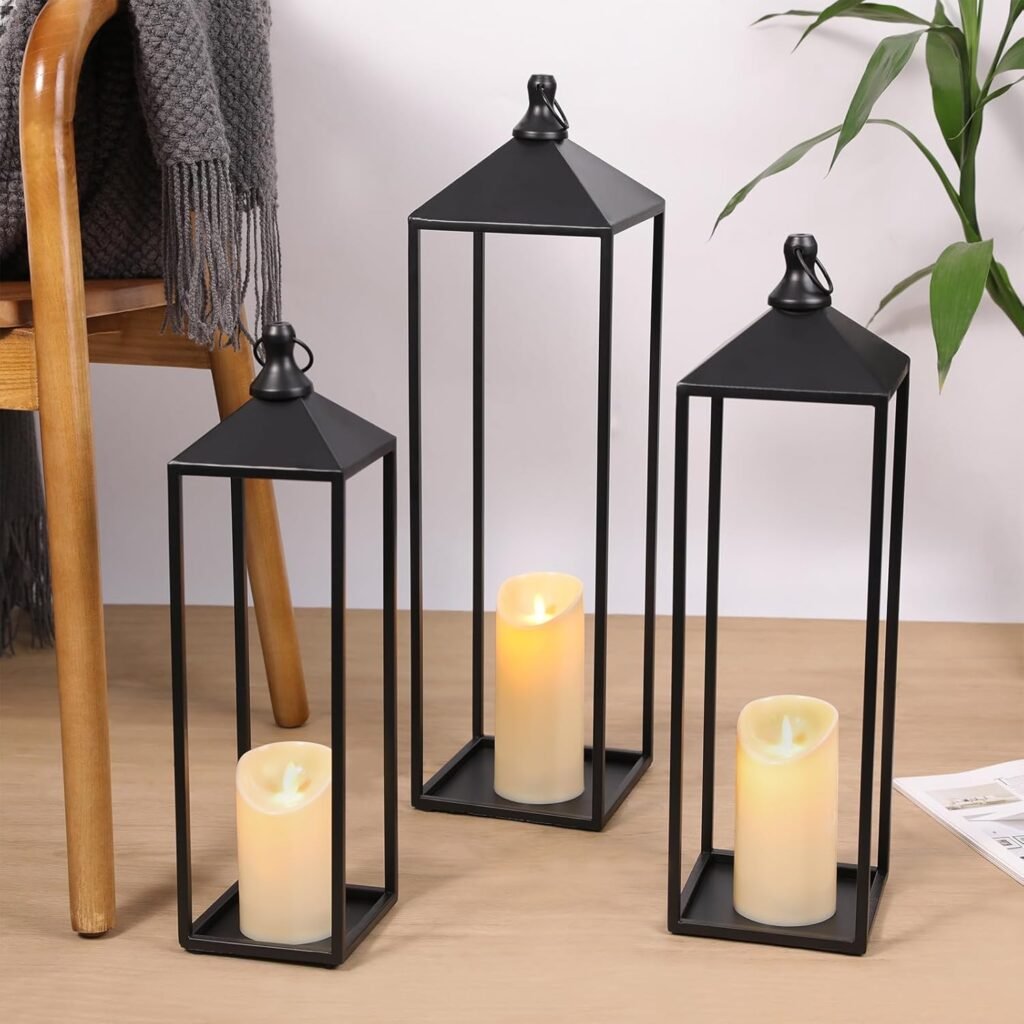 Modern black lanterns with faux pillar candles inside work with any porch makeover