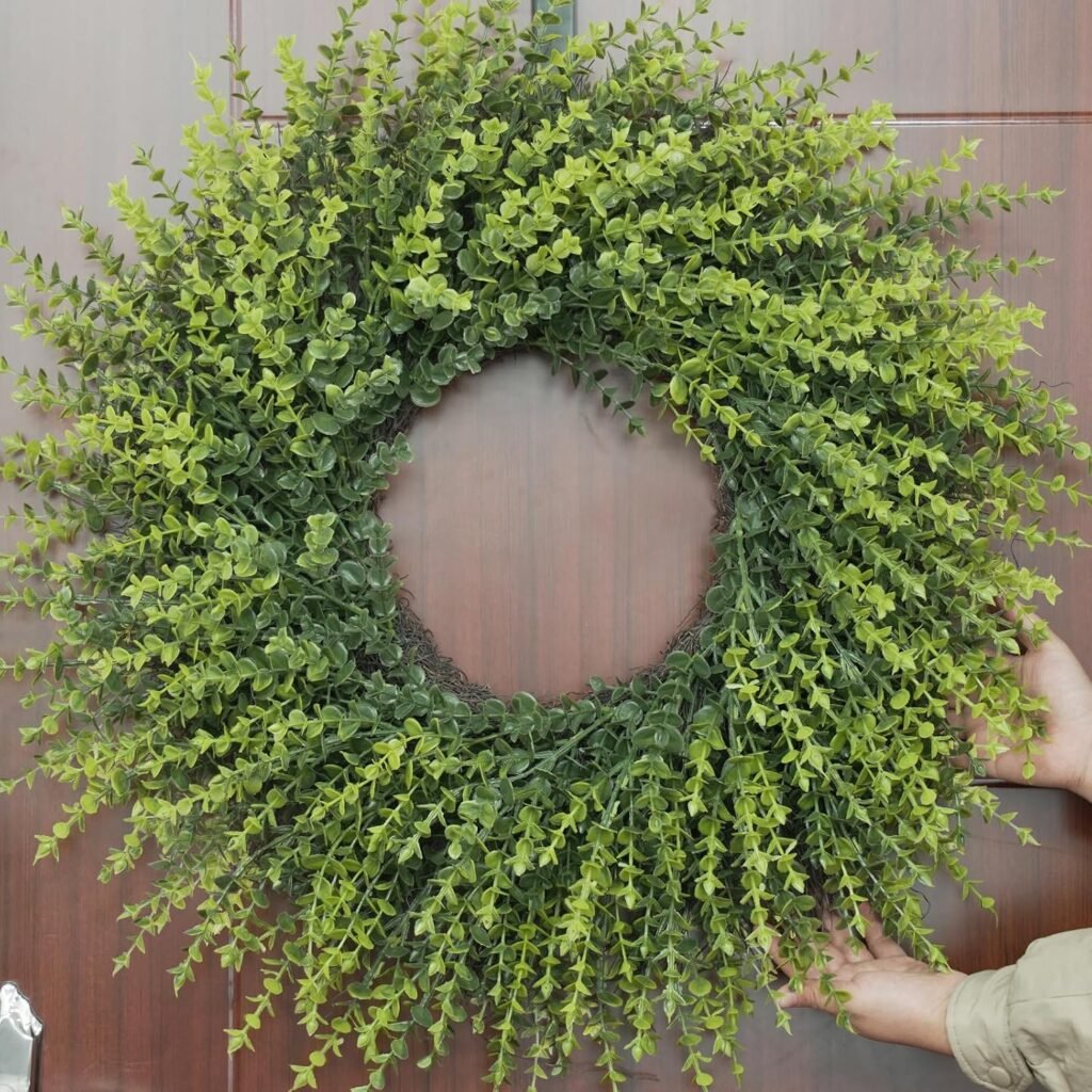 Boxwood wreath on a dark wood door