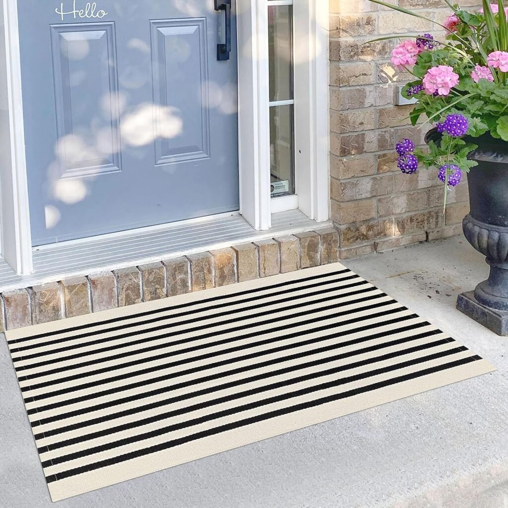Cream and black striped layering rug for porch makeover