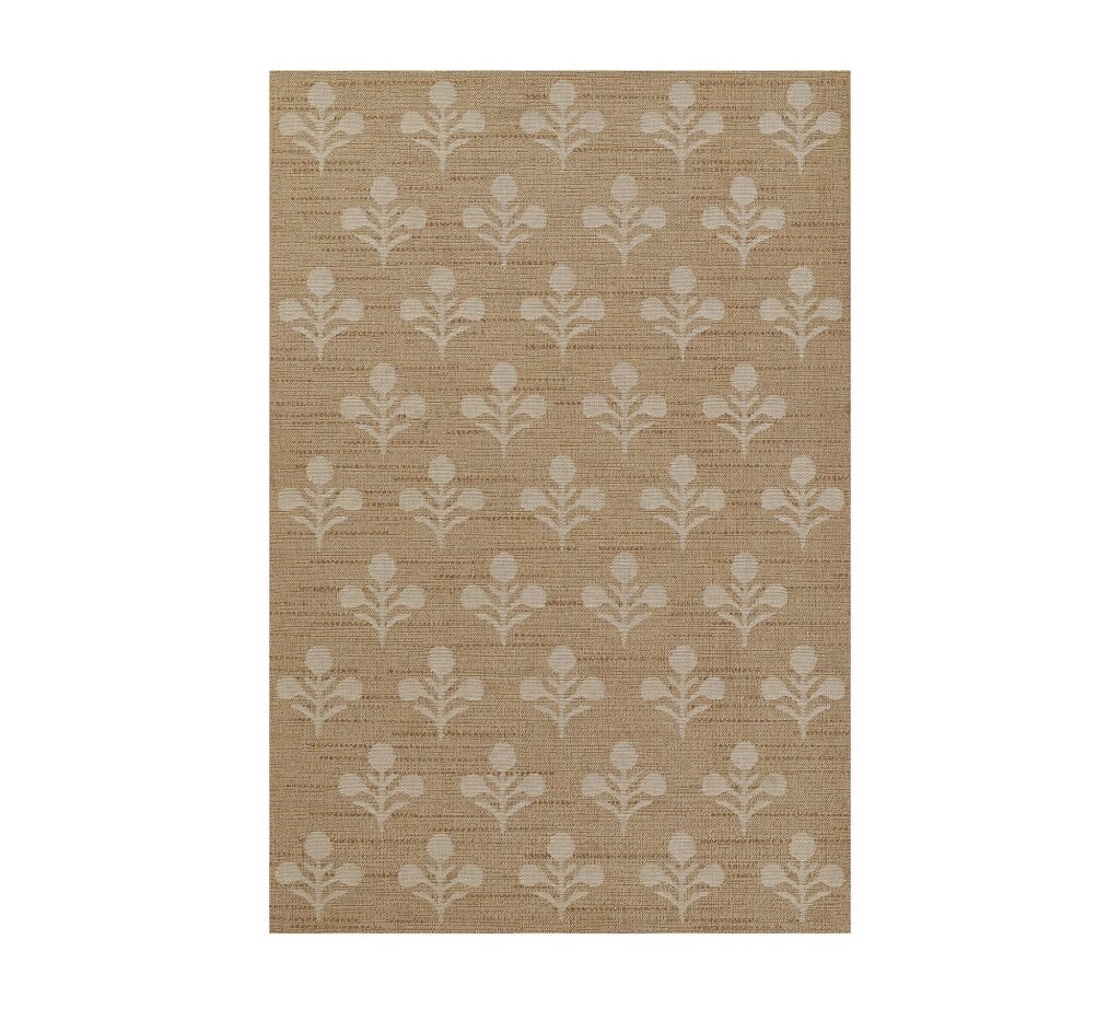 Beige and ivory abstract floral door mat. Layering rugs is a great way to create a cozy porch makeover!