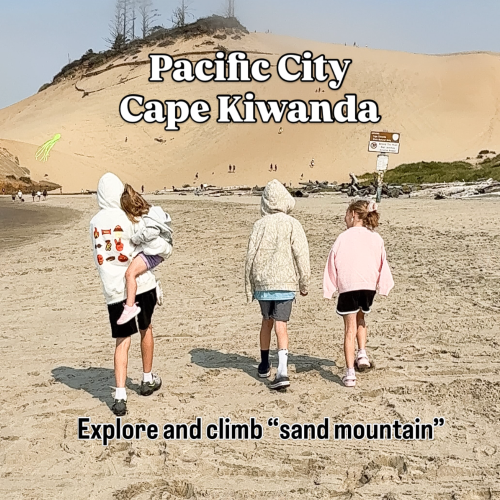 Oregon coast with kids idea: visiting Pacific City Cape Kiwanda. Four kids walking toward sand mountain
