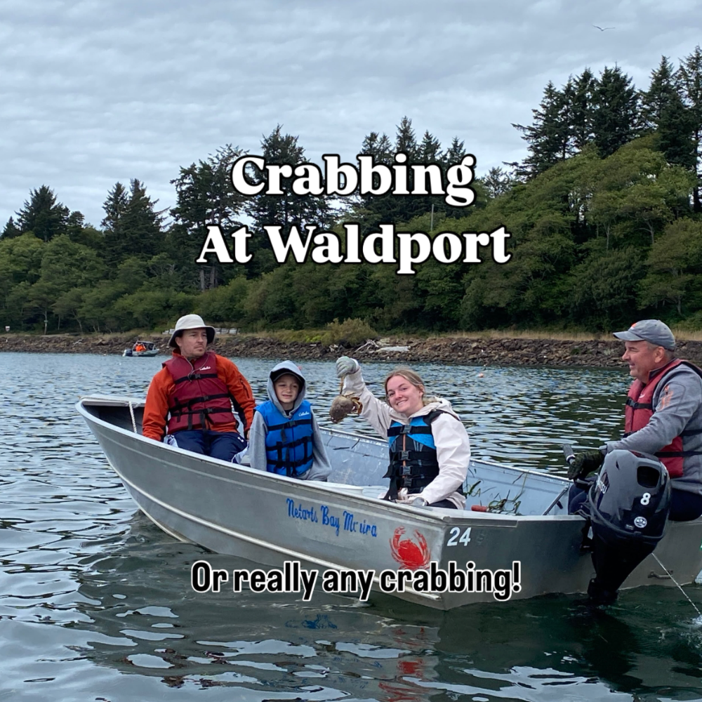 Oregon coast with kids idea: crabbing at Waldport. Image shows four people sitting in a small boat, one is holding a crab