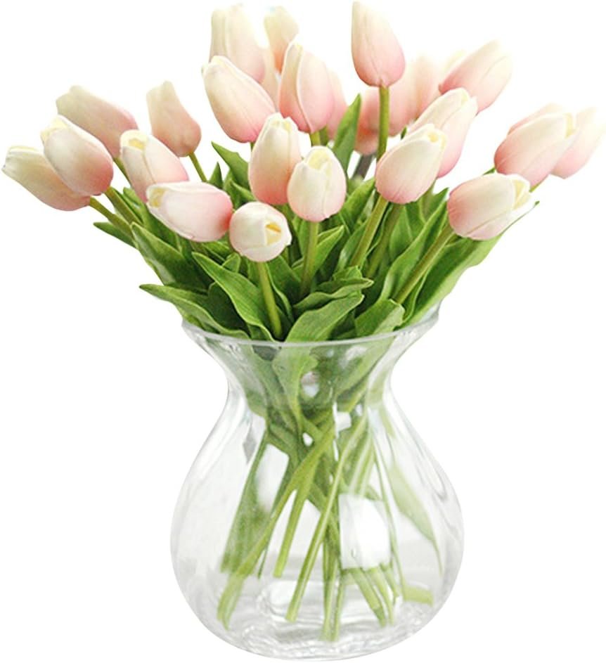 How to style a mantel for every season: pink tulips in a glass vase for spring