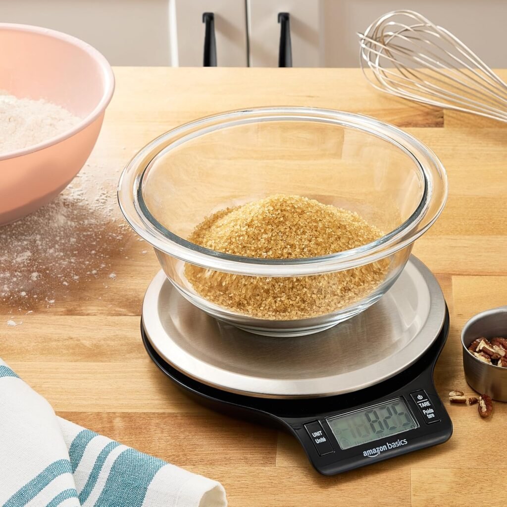 Sourdough tips for beginners: get a digital scale - it's much easier than measuring cups. This scale has a glass bowl full of brown sugar on top of it