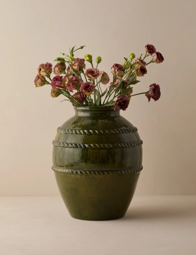 Green textured vase with dried florals for fall mantel styling