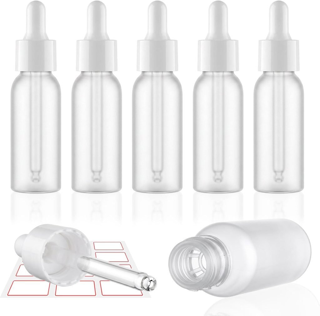 Clear plastic dropper bottles with labels for mixing and storing potions