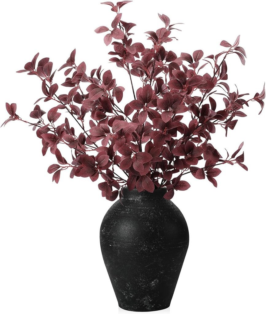 Purple eucalyptus in a black vase