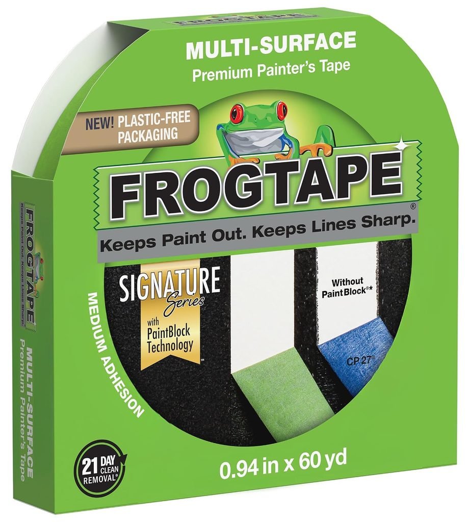 Green frog tape to outline the checkerboard pattern used in the patio transformation