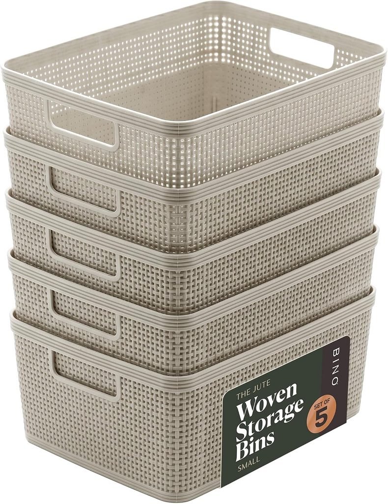 Stack of gray woven plastic storage bins for organizing DIY mud kitchen potion supplies
