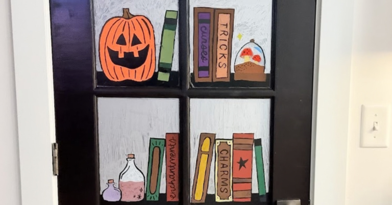 Easy Halloween Ideas for Kids: decorate a glass door with Halloween stencils and colorful chalk markers